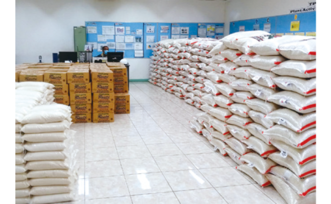 Food distribution by staff to local residents during Ramadan (Indonesia)